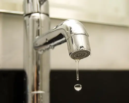 water-dripping-out-of-the-faucet